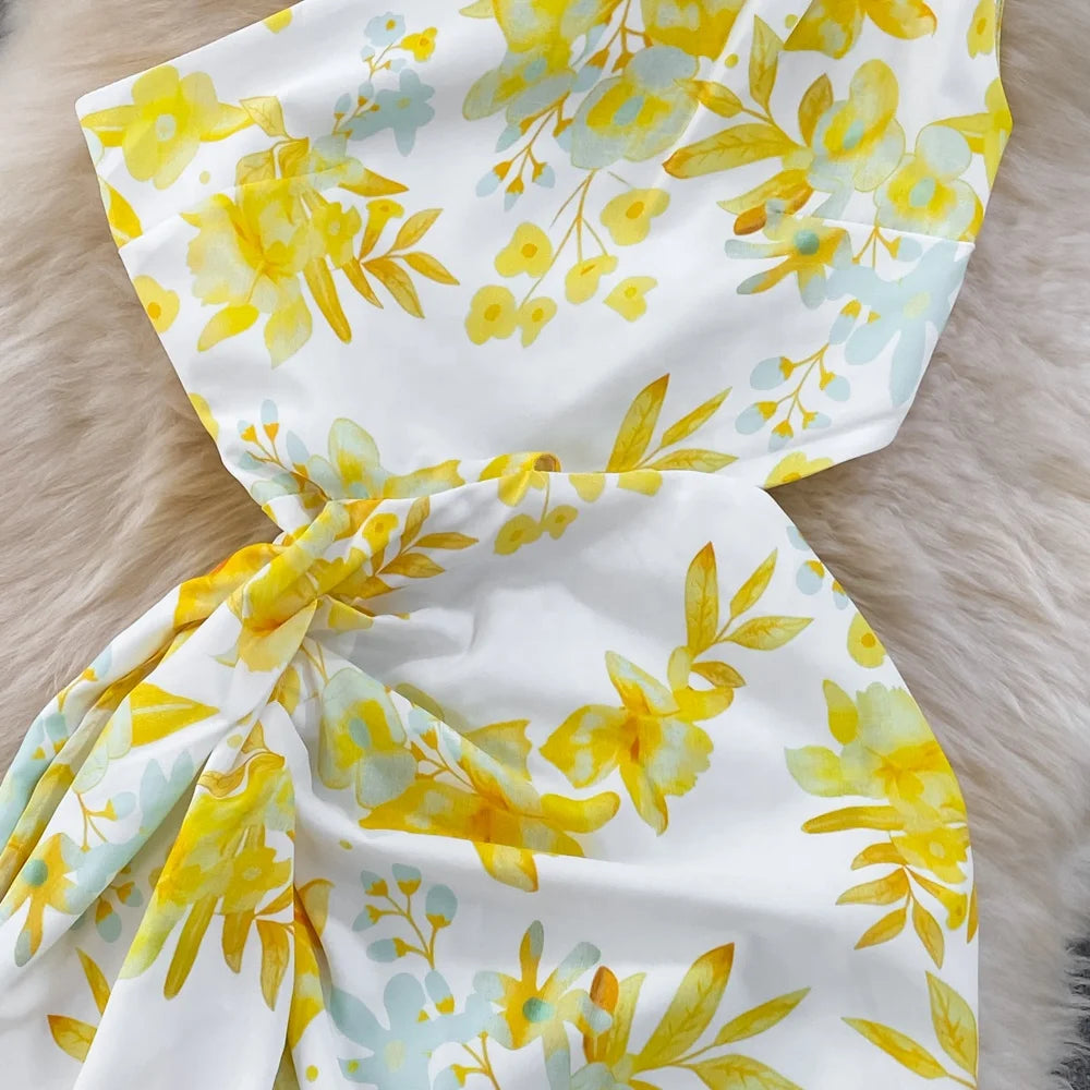 Robe longue asymétrique à fleurs jaunes – élégance ensoleillée
